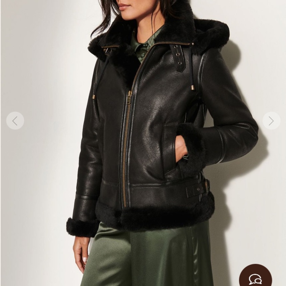 Chic Black Leather Jacket with Plush Trim